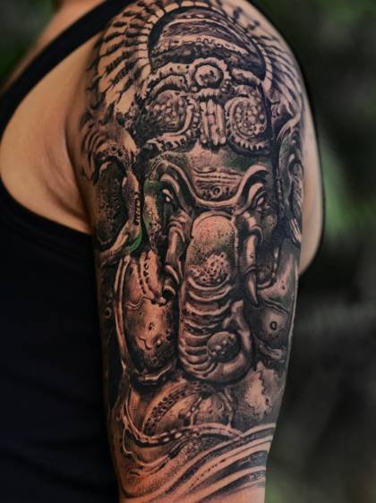 Ganesha sculpture realism sleeve tattoo by Bhikshu Tattoo Studio